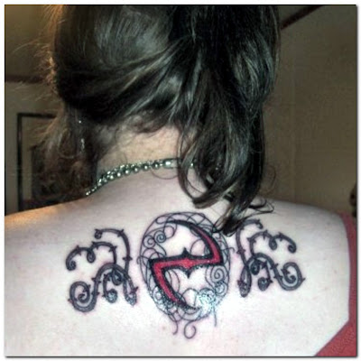 gothic tattoos. tear drop tattoo.