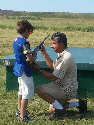 A trapshooter was born: William and hist first targets!