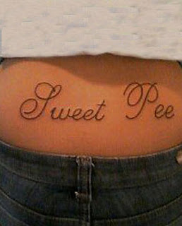 Failed tattoo - misspelled tattoo on the lower back