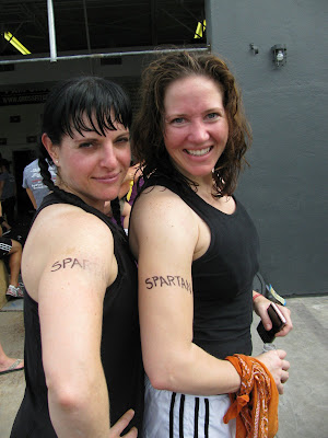 Erin and I were sweaty and our Spartan tattoos were smudged,