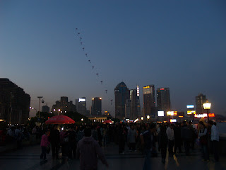 kites flying at the Bund at night