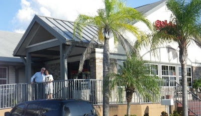 Janis and Bob waiting for me on the terrace of the Golden Corral, Largo, Florida.