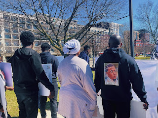 Patrick Lyoya's parents and brothers participating in the march