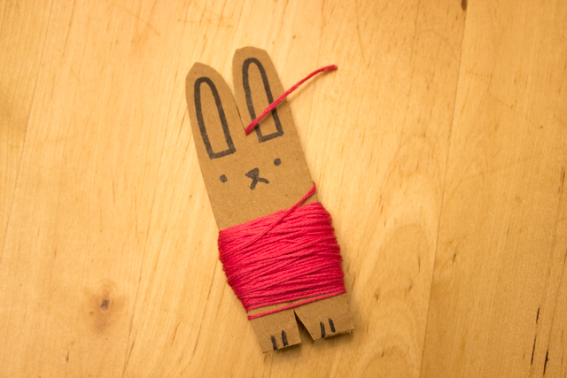 how to make DIY Embroidery floss storage out of cardboard! These cute bunnies are sure to organize all that thread!