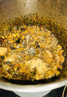 Grind all roster spices for sambar masala