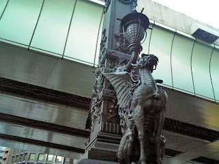 figure in bronze on nihonbashi bridge