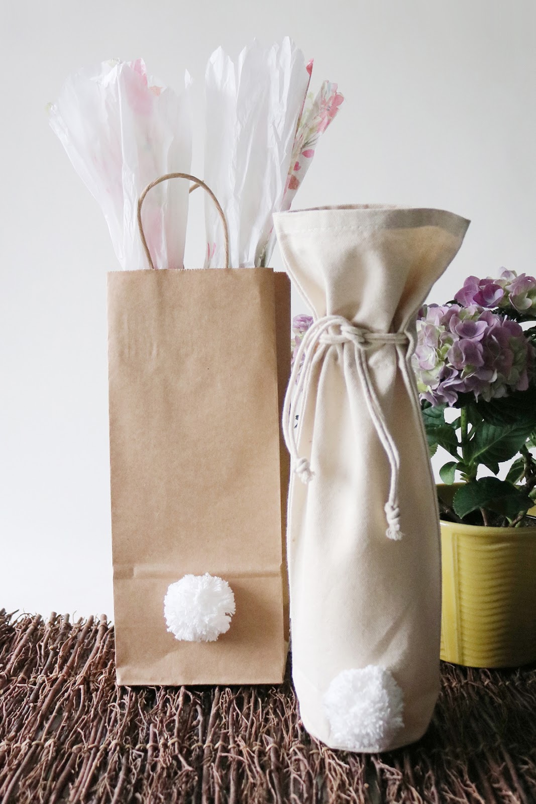 Easter gift bag inspiration - pom poms, tissue paper bunny ears and paper bags | Creative Bag