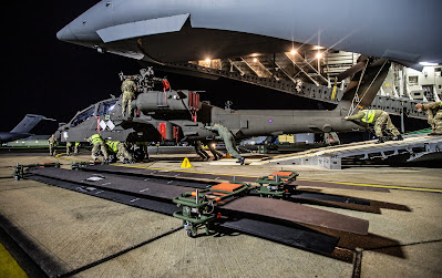 A 99 Squadron Globemaster unloads new British Army Apache helicopters from Kansas City in the United States at Royal Air Force Brize Norton on the 24th of November 2020