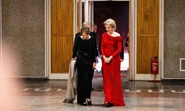 King Philippe and Queen Mathilde, President Frank-Walter Steinmeier and Elke Büdenbender. Queen Mathilde wore a red gown