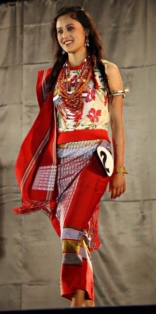 A Moyon model showcasing her traditional attires