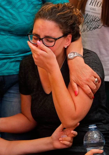 Tal Ovadia, the wife of slain Yotam Ovadia (31), mourns at his funeral in Jerusalem