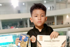Emas Pertama Aijaz Raffasya Pesilat Cilik Karang Tengah Bersinar di SBCC IV