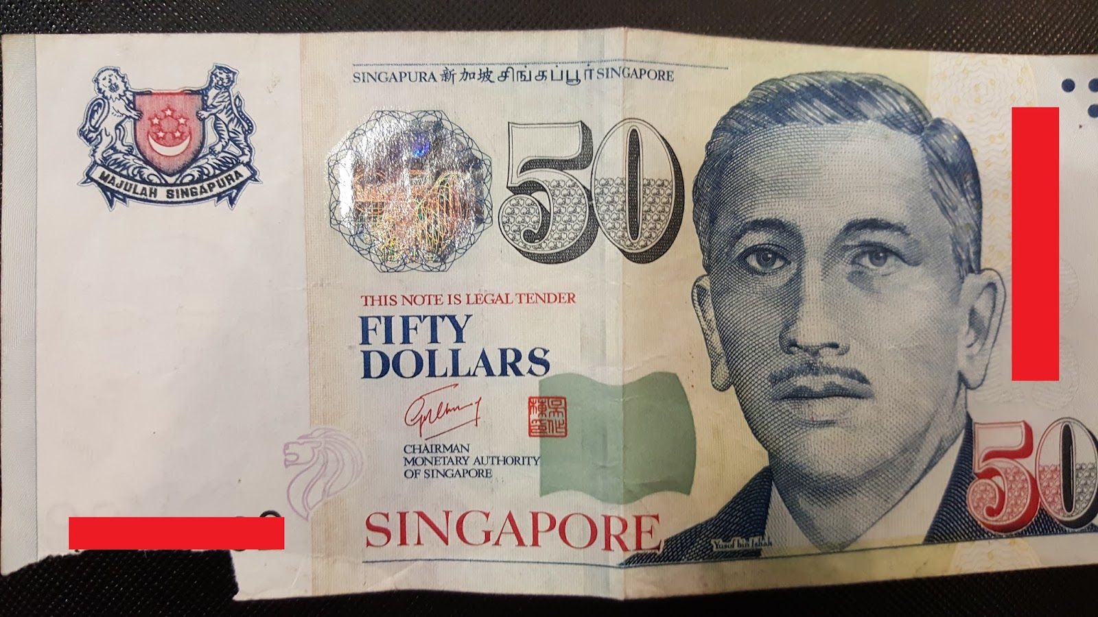 Saya シンガポールで破れたお札の交換