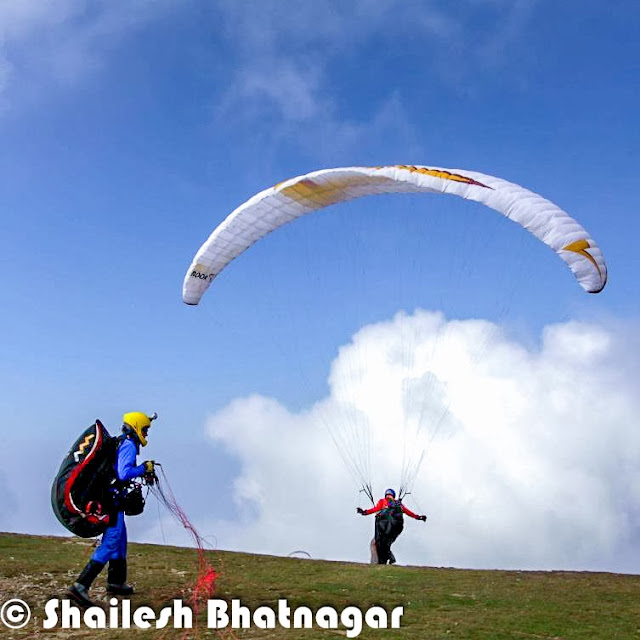 Himachal Pradesh, Bir Billing is often hailed as the paragliding capital of India. With its perfect blend of favorable weather conditions, scenic landscapes, and reliable thermals, Bir Billing attracts paragliding enthusiasts from around the world. The site offers a variety of take-off points, ranging from gentle slopes to steep cliffs, catering to flyers of all skill levels. Whether you're a beginner or an experienced pilot, Bir Billing promises an unforgettable paragliding experience amidst the stunning backdrop of the Dhauladhar range.