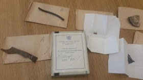 Gli oggetti trovati negli archivi del Museo della Scienza sono stati accompagnati da una nota che legge "presunti bit UFO"