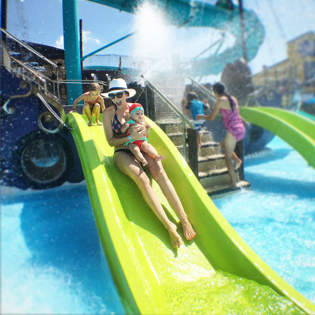 Amy West and daughters conquer the slides at Shipwreck Island Waterpark