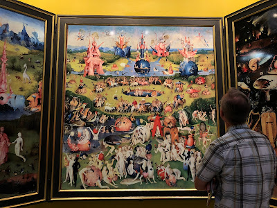 Studying The Garden of Earthly Delights up close.