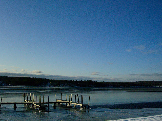 Frozen blue lake in Laconia, New Hampshire.