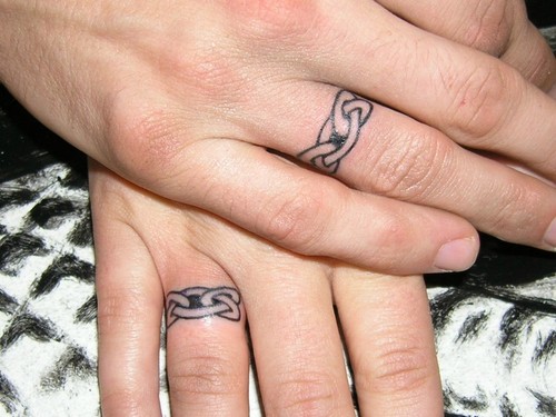 have been oddly fascinated by the growing trend of wedding band tattoos.