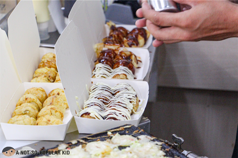 Preparing the takoyakis in New Hatchin Japanese Grocery