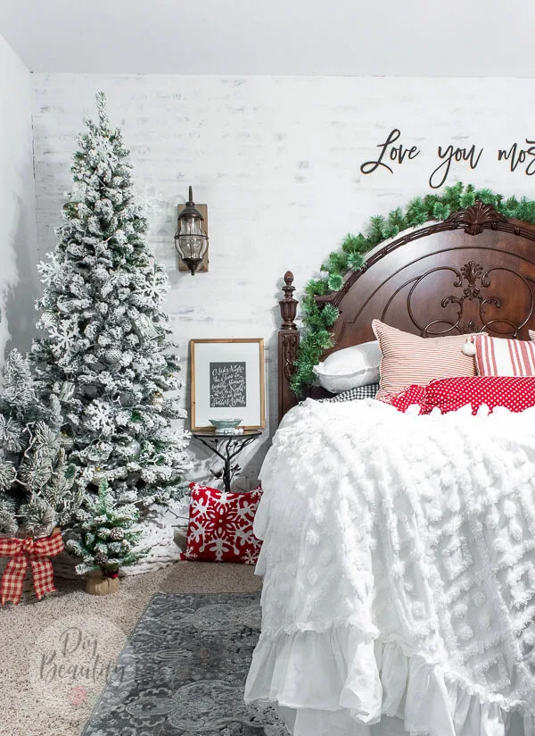 Christmas bedroom with flocked trees and red and white