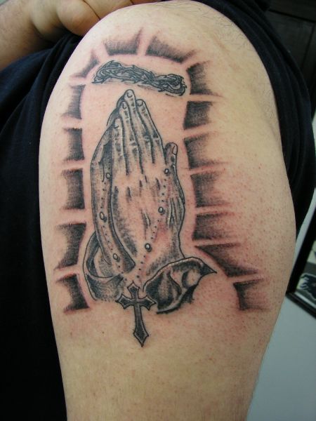 My first praying hands tattoo is this stunning tattoo with matching rosary