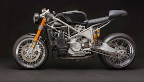Ducati 999VX Cafe Racer Ducati 999VX Custom Cafe Racer by Venier Custom, New York based custom bike builders Venier Custom Motorcycles recently built a custom Ducati Cafe Racer based on Ducati 999S “Testastretta,” transforming it from a race bike to Street legal cafe racer.  Ducati 999VX Cafe Racer Modification  Ducati 999VX custom leather seat,  spoked wheels from Ducati GT1000  Custom Ducati Zard muffler Venier Custom Cafe racer Seat Ducati 999VX Cafe Racer Custom Fenders