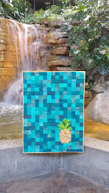 Pineapple Twist quilt pattern using prairie points to create texture