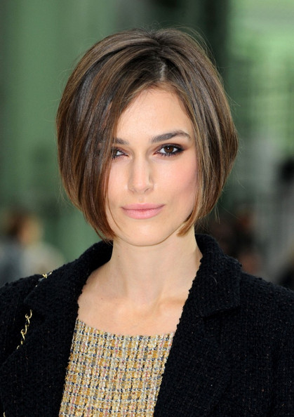 hairstyle long in front short in back. Shorter in the ack and longer
