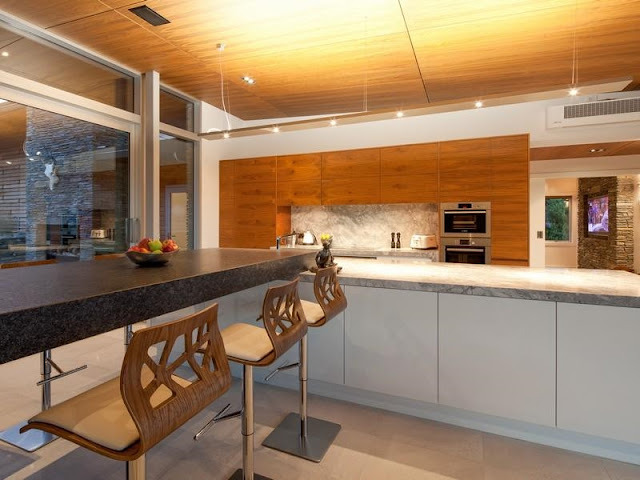 Modern kitchen in the glass house 