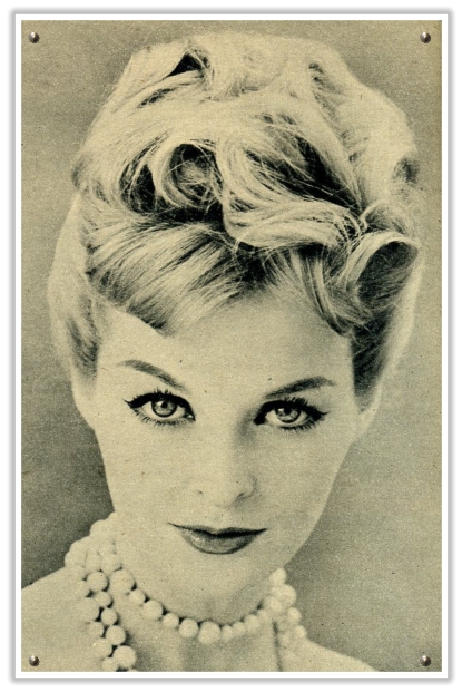 Vintage pearls and a fun sophisticated 1950s updo great even for short hair