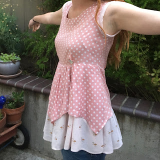 Picture of enjoing the completed polka dot and add flamingo material top.