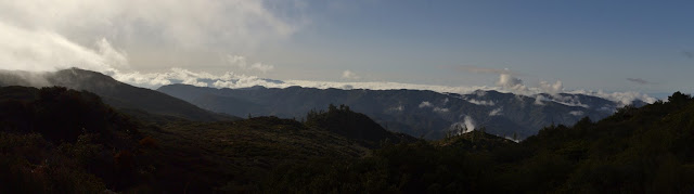 bits of cloud over the southerly mountains