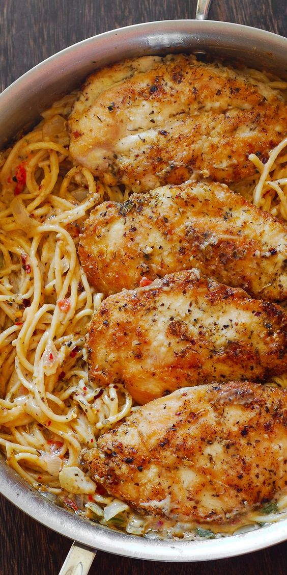 Chicken Breasts with Pasta in Creamy White Wine Parmesan Cheese Sauce-I season chicken with Tonys seasoning instead of salt and pepper, then dip in flour mix