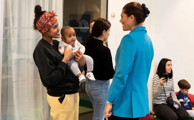 Crown Princess Victoria wore a wool-blend blue blazer by H&M. Kallan Jarva asylum application center