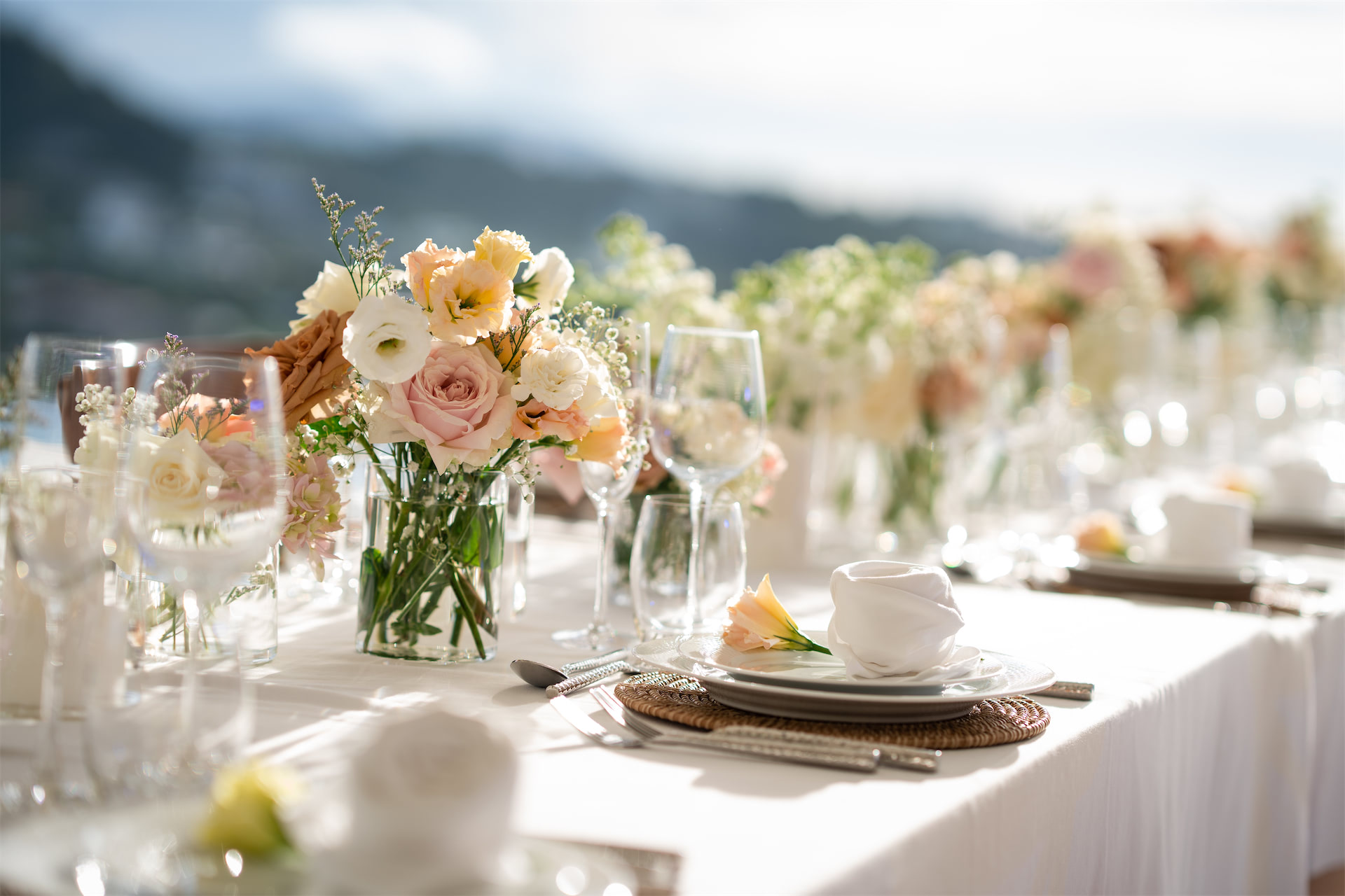 Table with Tableware Like Plates, Glass, Butter Knifes, Spoons