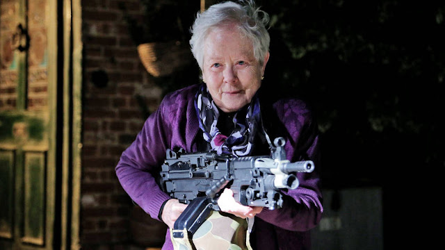 old lady with a machine gun