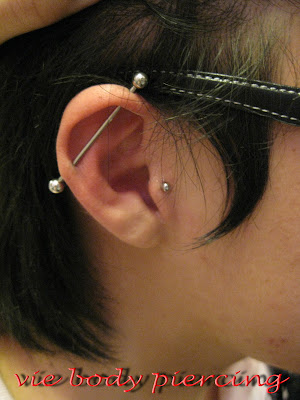 The industrial piercing is two or more separate rim (or cartilage) piercings