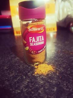 Schwartz Fajita Seasoning On a black granite kitchen top. 