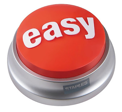 The iconic Staples® “Easy Button™” is a round, red-and-silver button marked “easy” in white.