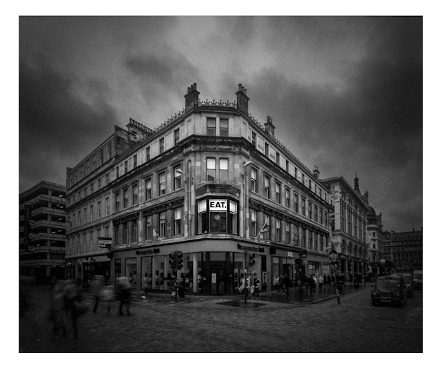 Image of a Glasgow eatery proudly displaying a bold "Eat" sign, presumably the name of the establishment.