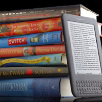 stack of books and an ereader