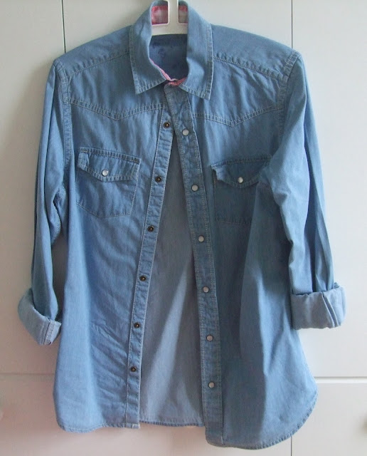 pale blue denim shirt with turned up sleeves