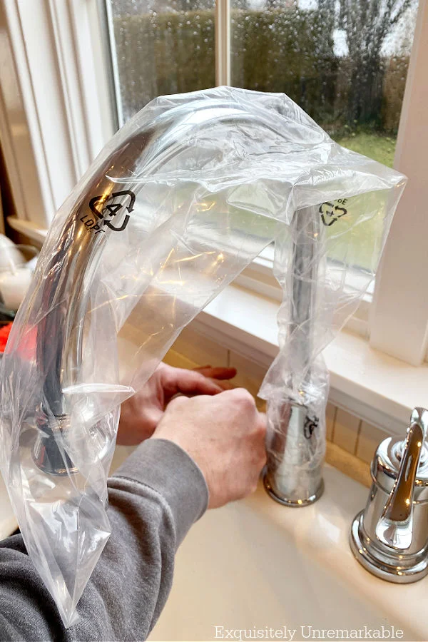 Pfister Avalon Chrome Faucet covered in a plastic bag during installation