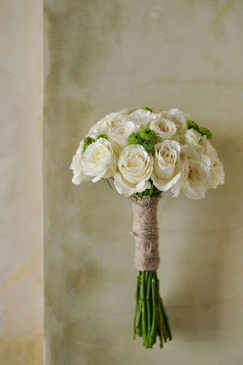 bouquet made from white roses, green spray chrysanthemums, wrapped with burlap and natural string 