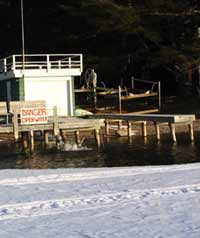boat house protected from ice damage with a Kasco Marine Deicer