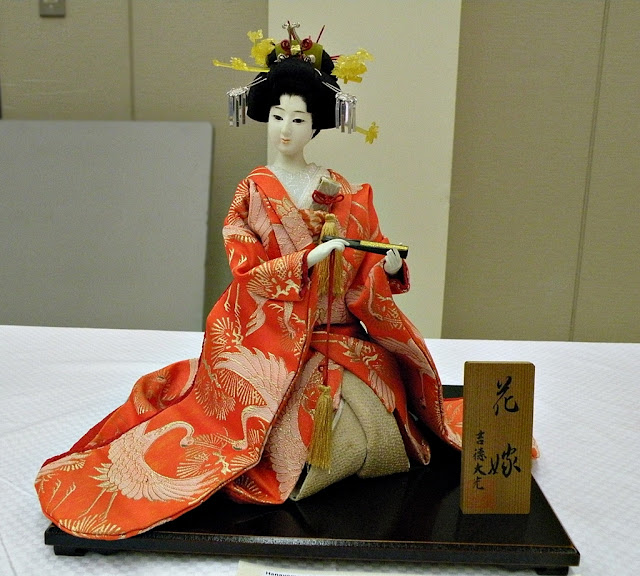 Traditional Japanese doll Hanayome dressed in traditional wedding costume