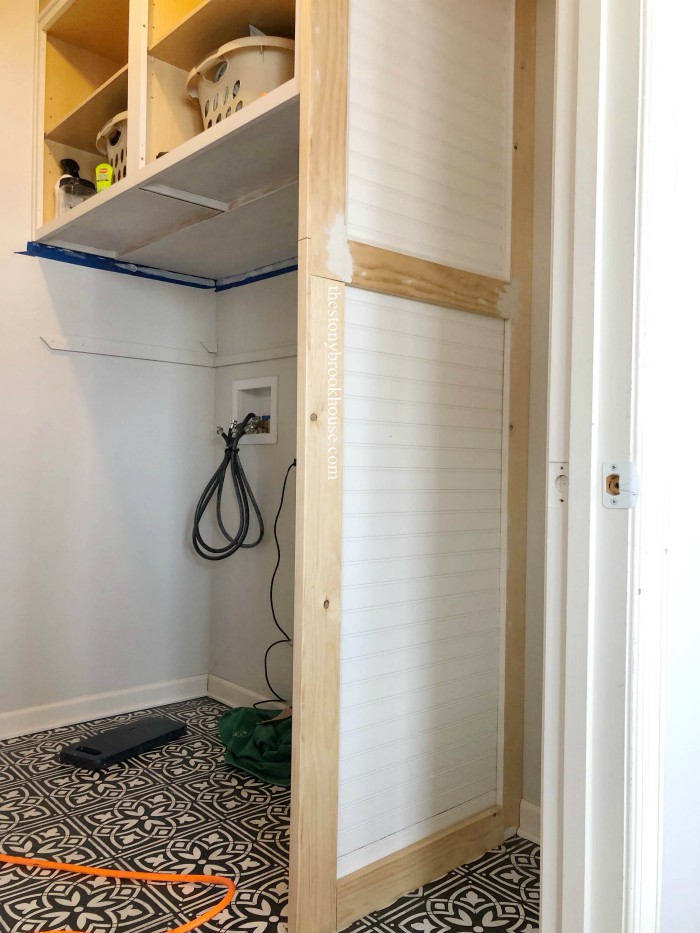 Faux wall Laundry Room Built-in