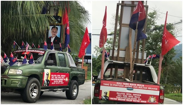 Polis tahan dua 2 lelaki berkempen bawa gambar  Agung dan bendera PH