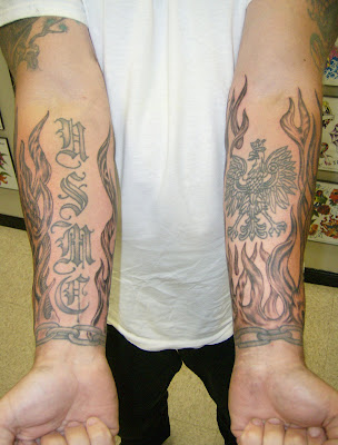 flames tattoo Black and gray flames on both arms all done in the same 